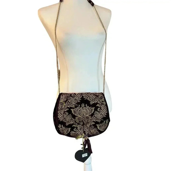 Imoshion Handbags - Imoshion purse NWT plum velvet with gold flourishing and chain